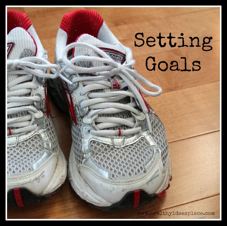 The words "Setting Goals" next to a pair of running shoes