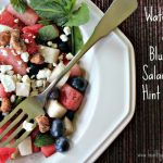The words "Watermelon and Blueberry Salad with a Hint of Mint" next to a photo of the salad