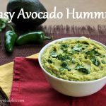 The words "Easy Avocado Hummus" over a photo of the hummus in a white bowl
