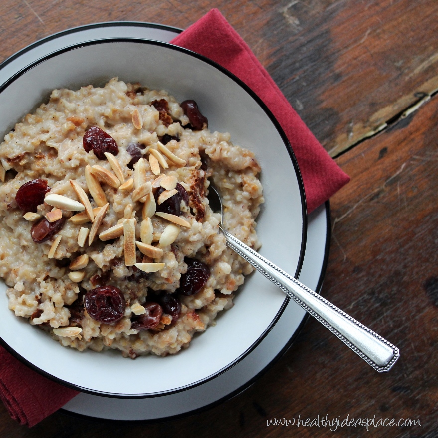 Cherry vanilla overnight oats in a bowl with a spoon