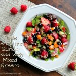The words "Triple Berry and Quinoa Salad" to the left of the salad