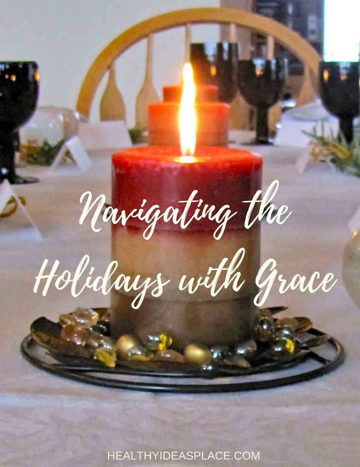 Navigating the Holidays with Grace text over the image of a lit candle