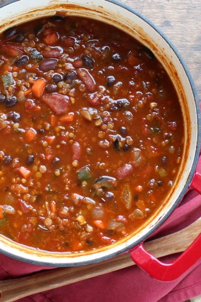 Overhead view of Vegetarian Chili with Red Lentils in a Dutch oven