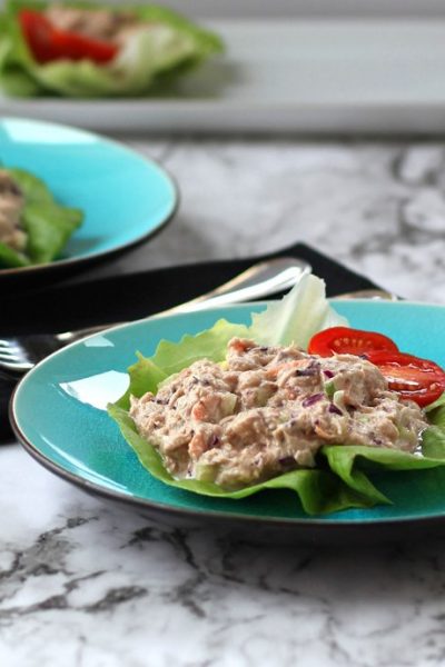 Two blue plates with Tuna Salad Lettuce Wraps