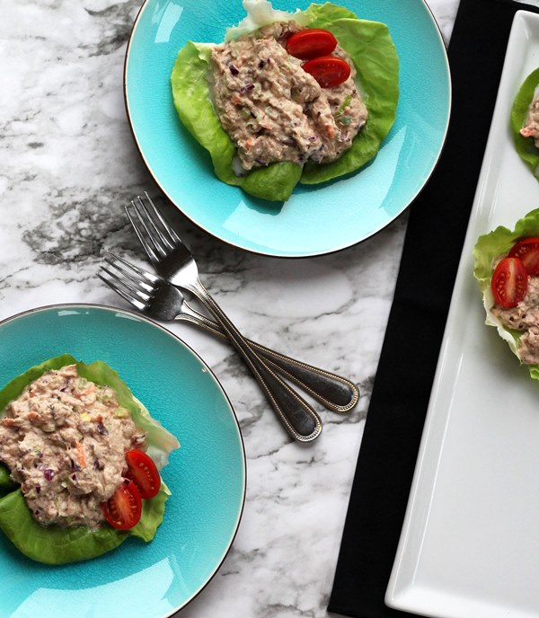 Tuna Salad Lettuce Wraps - Made with Greek yogurt and plenty of chopped veggies, this delicious tuna salad makes a perfect dish for lunch or supper. Serve on your favorite bread, stuffed in tomatoes or cucumbers, or with lettuce wraps. Delicious!