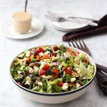 chopped salad in a white bowl